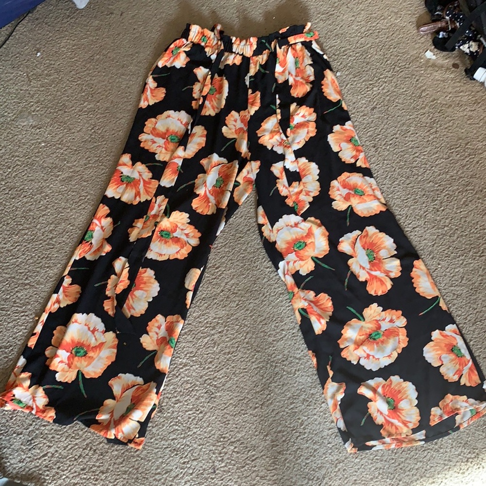 Forever 21 black and orange floral Palazzo pants. Comes with matching belt
